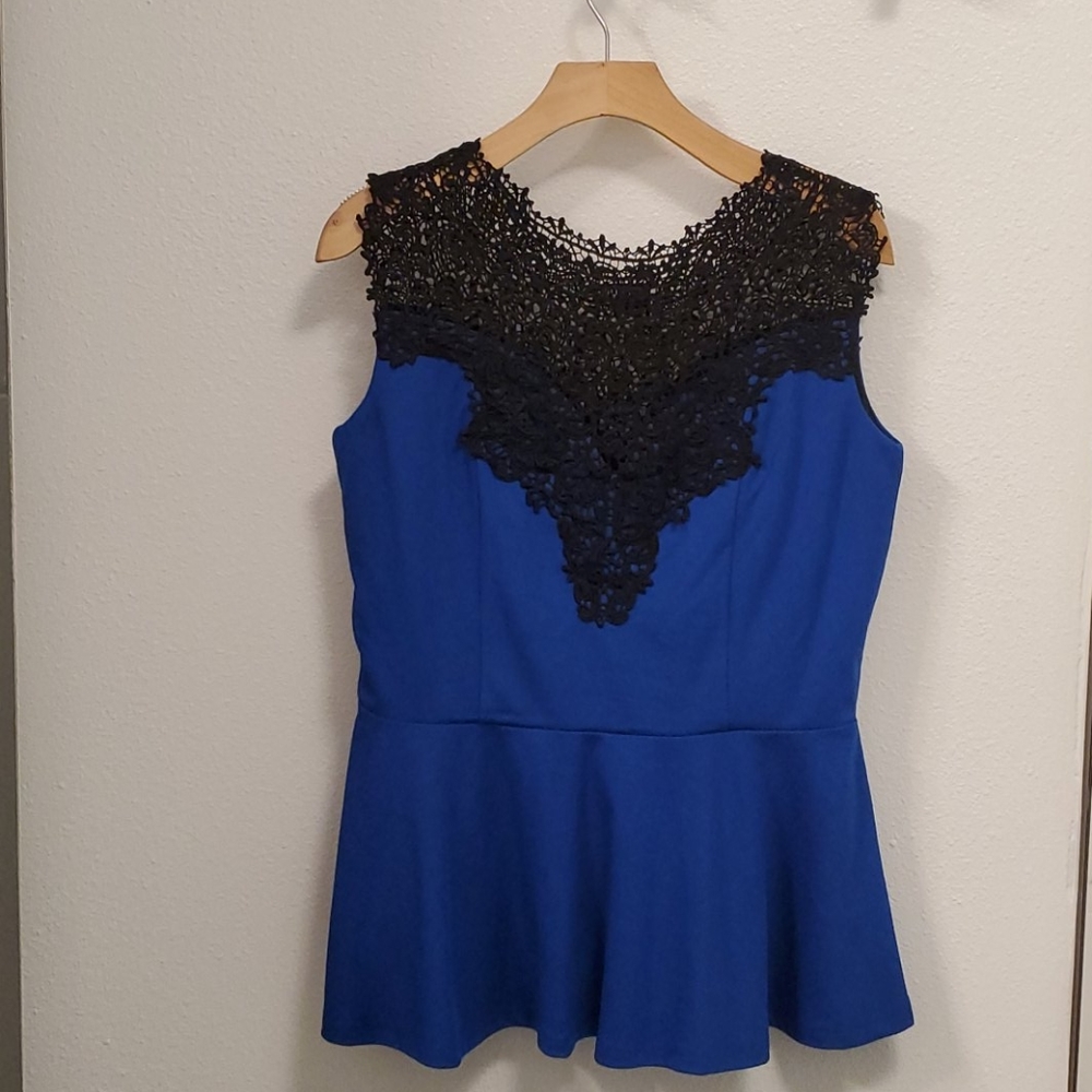 City chic peplum top